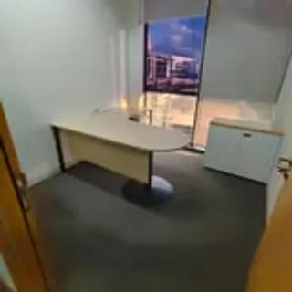 Office desk reinstalled in a private room during Singapore office move
