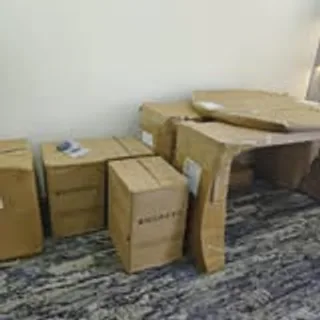 Flat-pack furniture cartons delivered and ready for assembly in Singapore